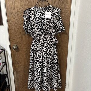 Glamorous Black and White Wrap Midi Dress with Flutter Sleeves